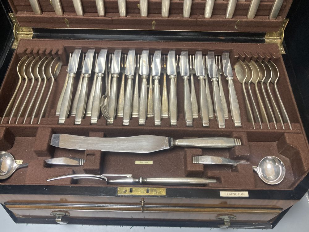 A cased Elkington plated canteen of Rochester-pattern cutlery, near complete, and similar oak cased set of twelve fish knives and forks